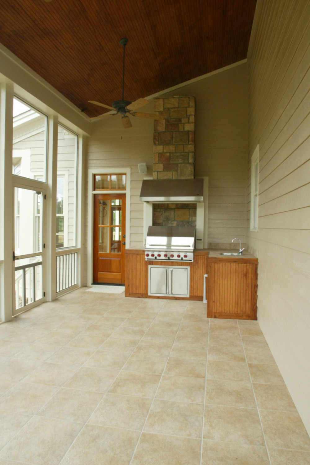 Outdoor kitchen with stone floor